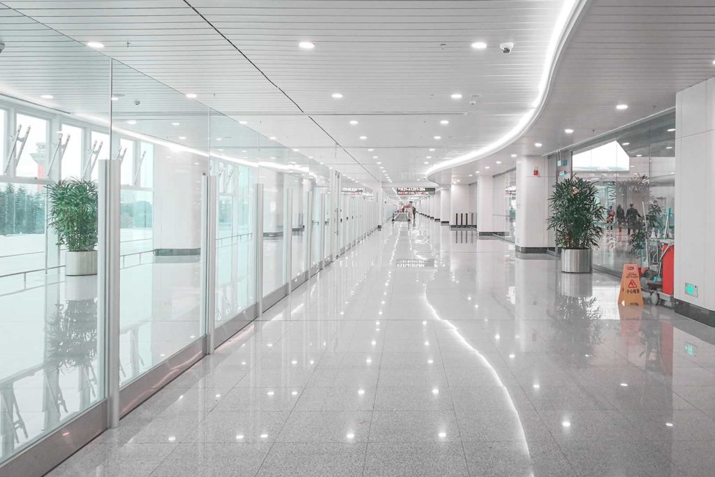 expansive office building with white tile floor