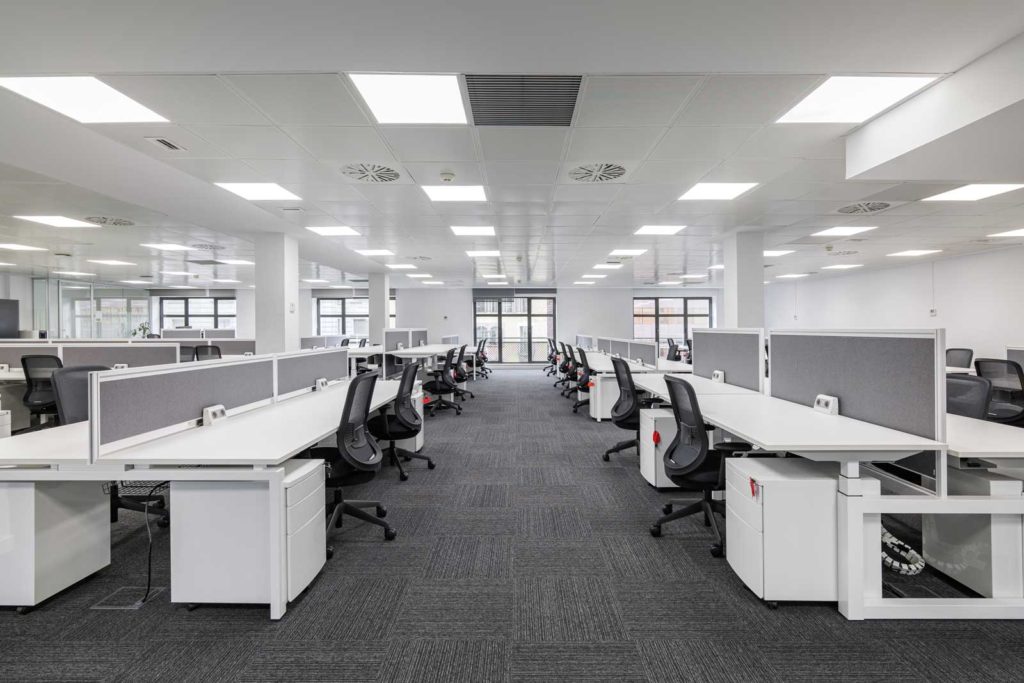 Interior of an large office with lots of chairs